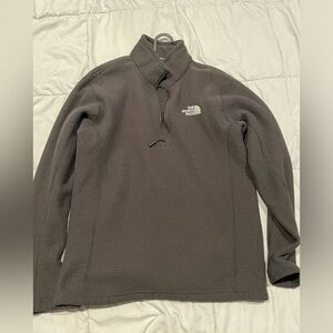 Northface half Zip medium black.